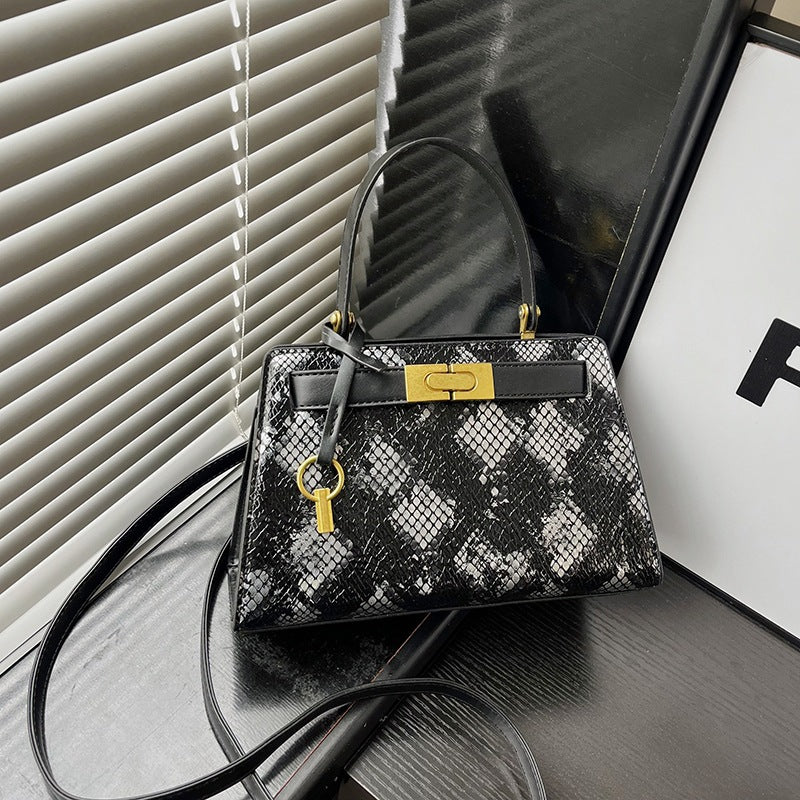 Bolso de Mano y Bandolera de Platino con Estampado de Serpiente a la Moda