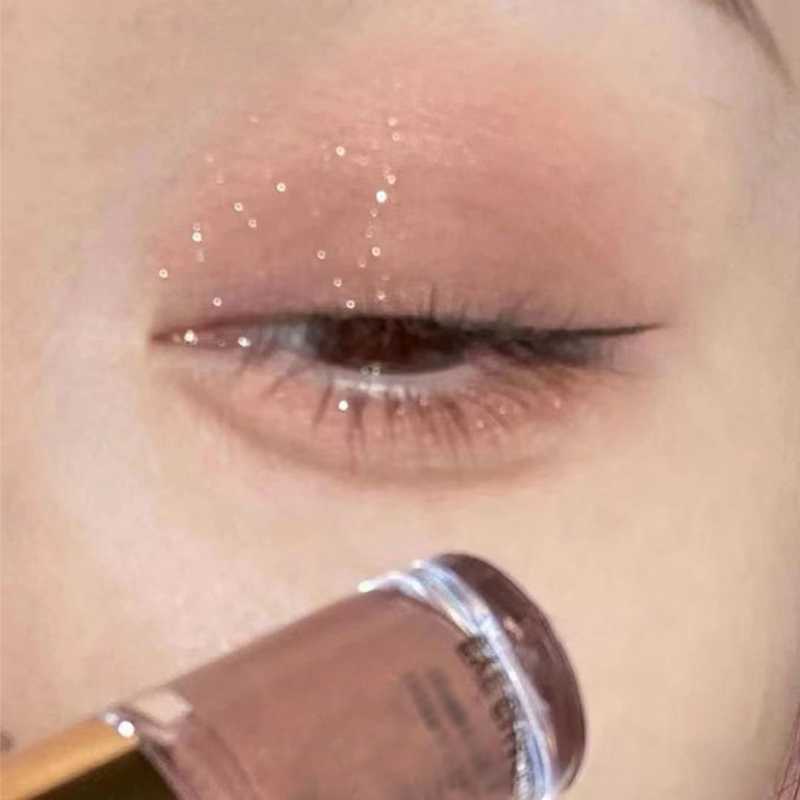 Barra de Sombra de Ojos Líquida de Brillo Marrón y Crema de Contorno